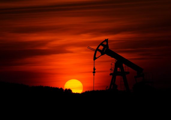 oil pump in front of a sunset